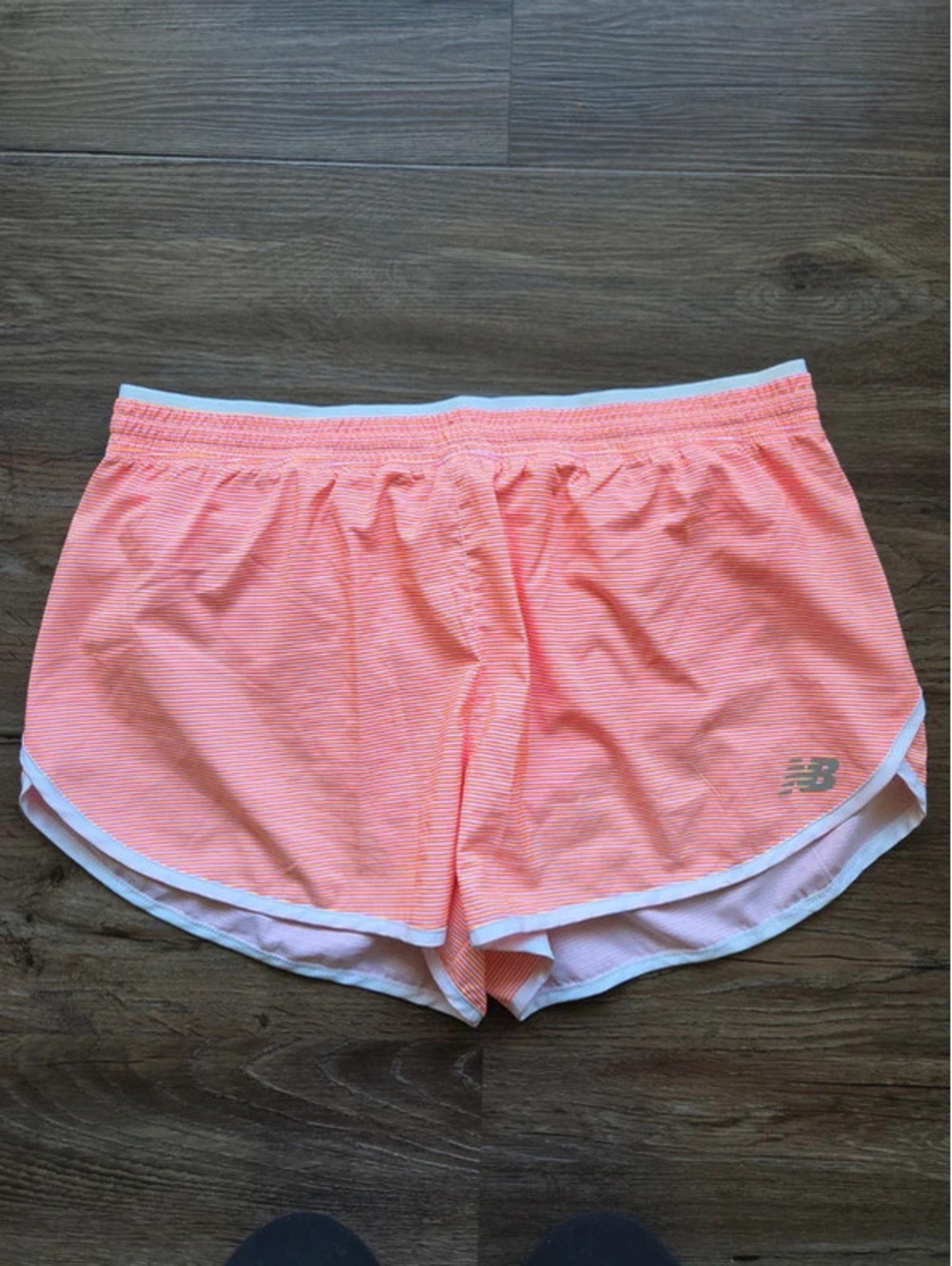 New balance orange and pink striped athletic short size large